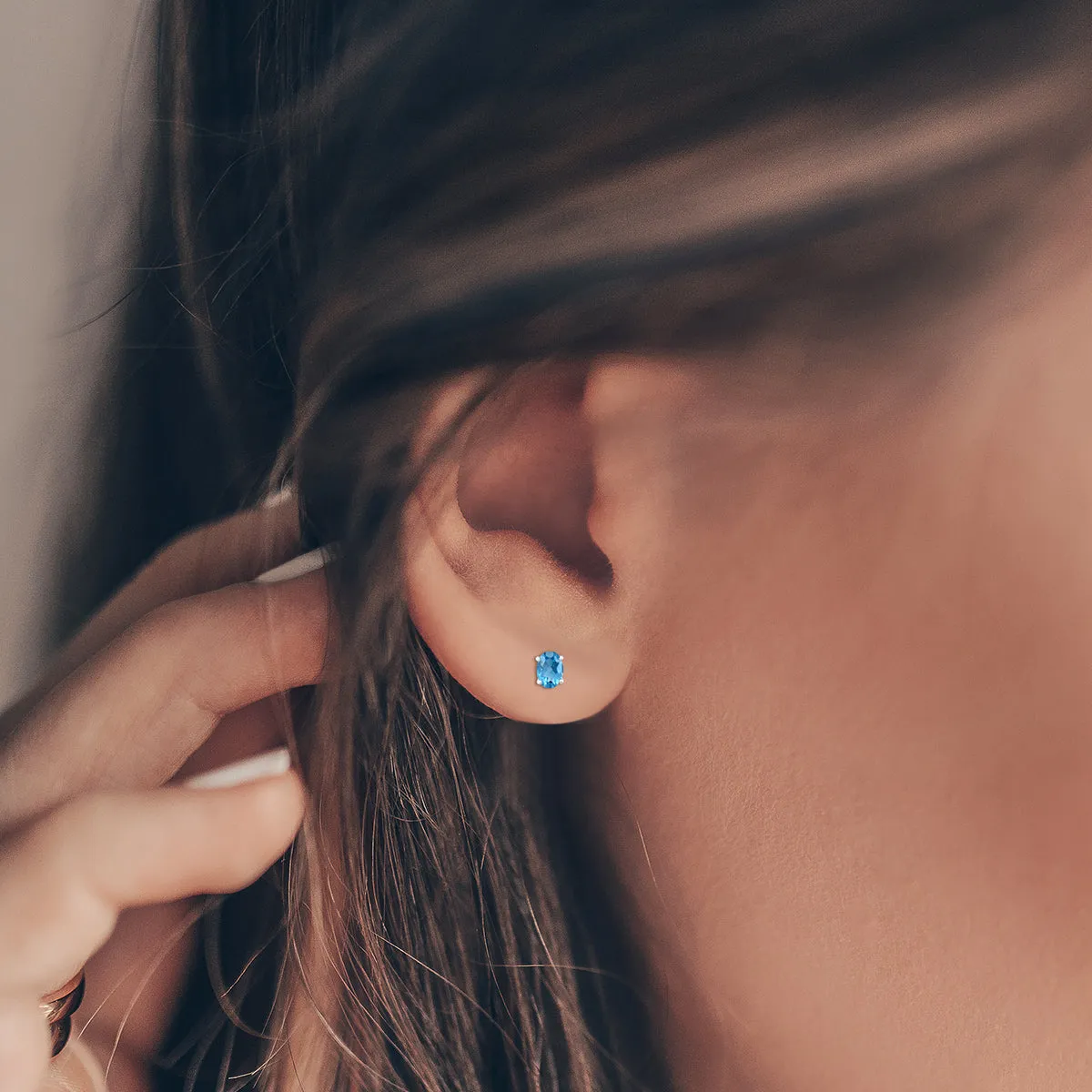 14K White Gold 7X5Mm Oval Blue Topaz Earrings
