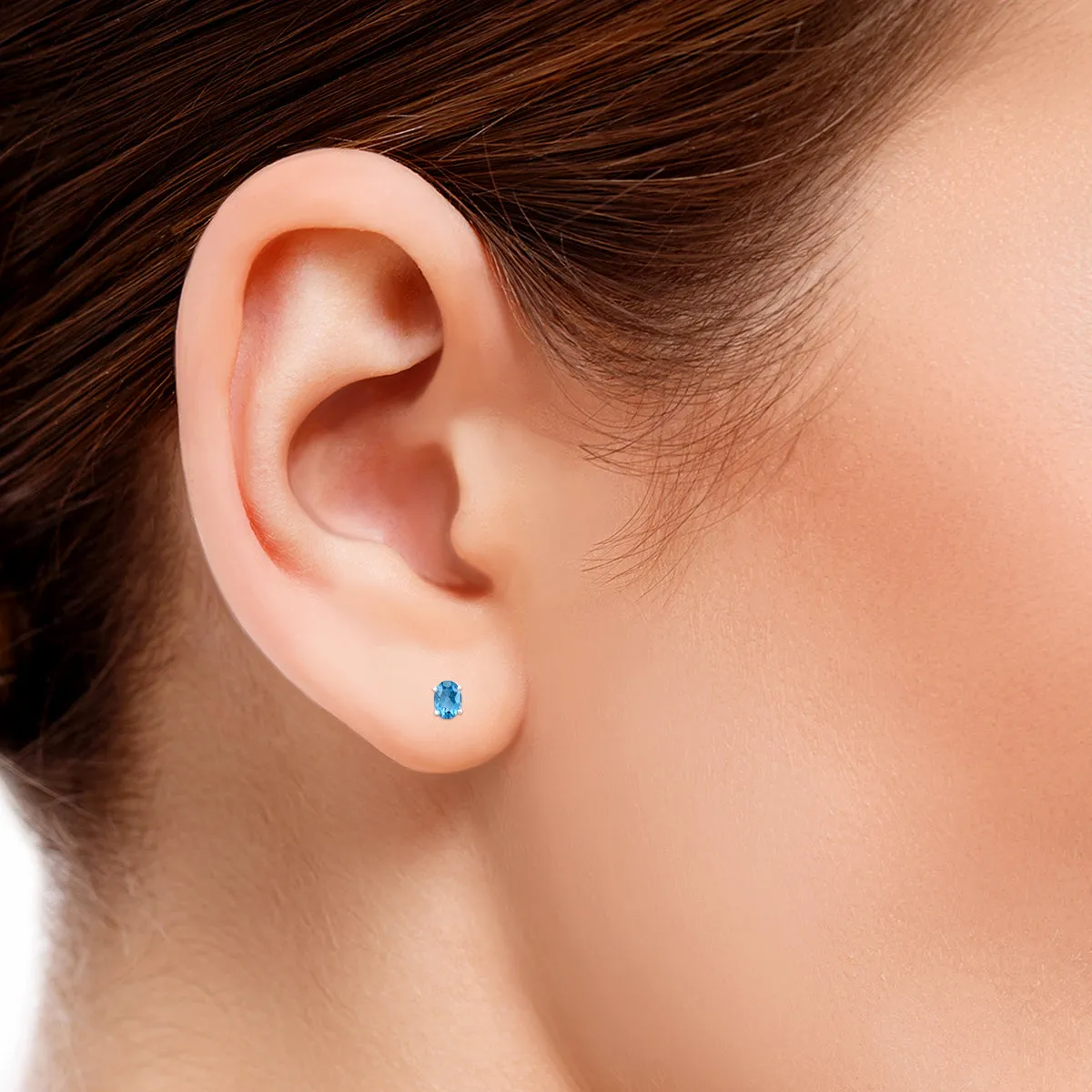 14K White Gold 7X5Mm Oval Blue Topaz Earrings