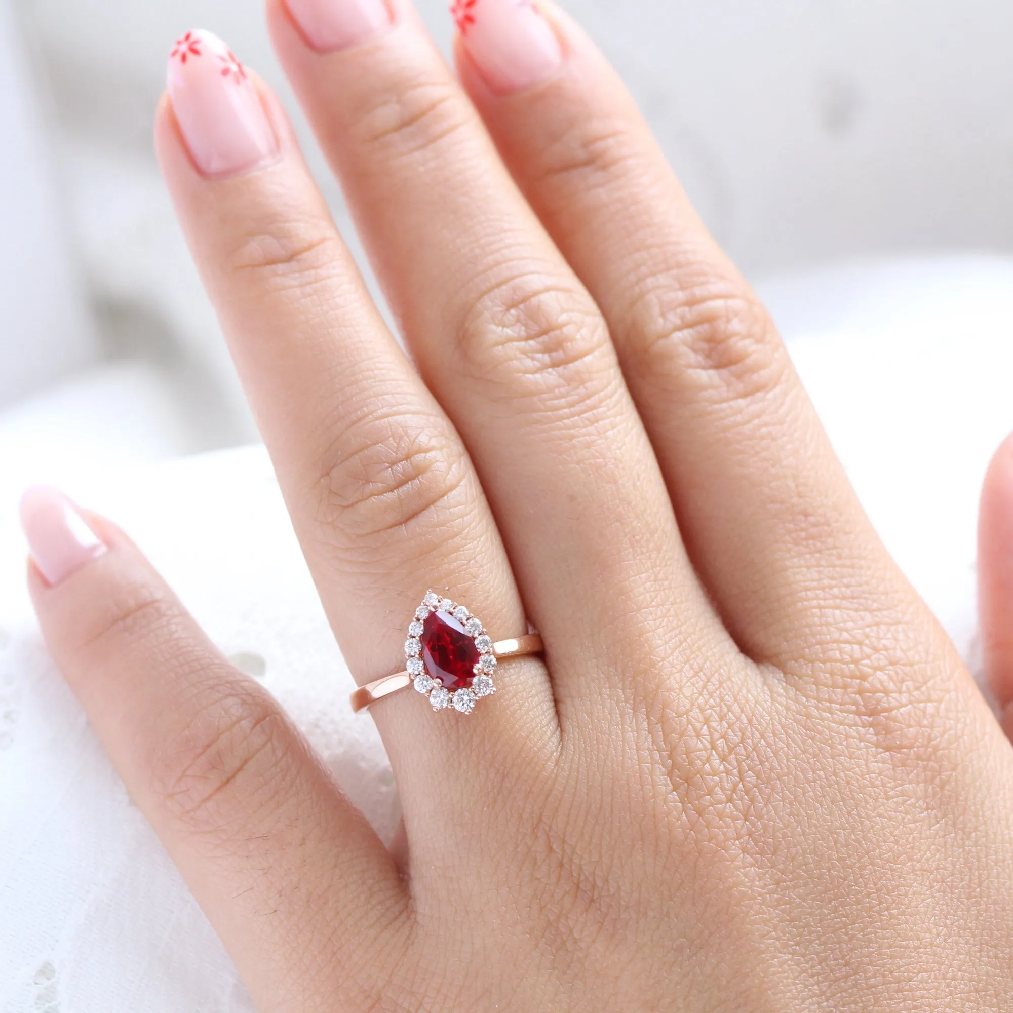 Pear Ruby Engagement Ring in Tiara Halo Diamond Tapered Band