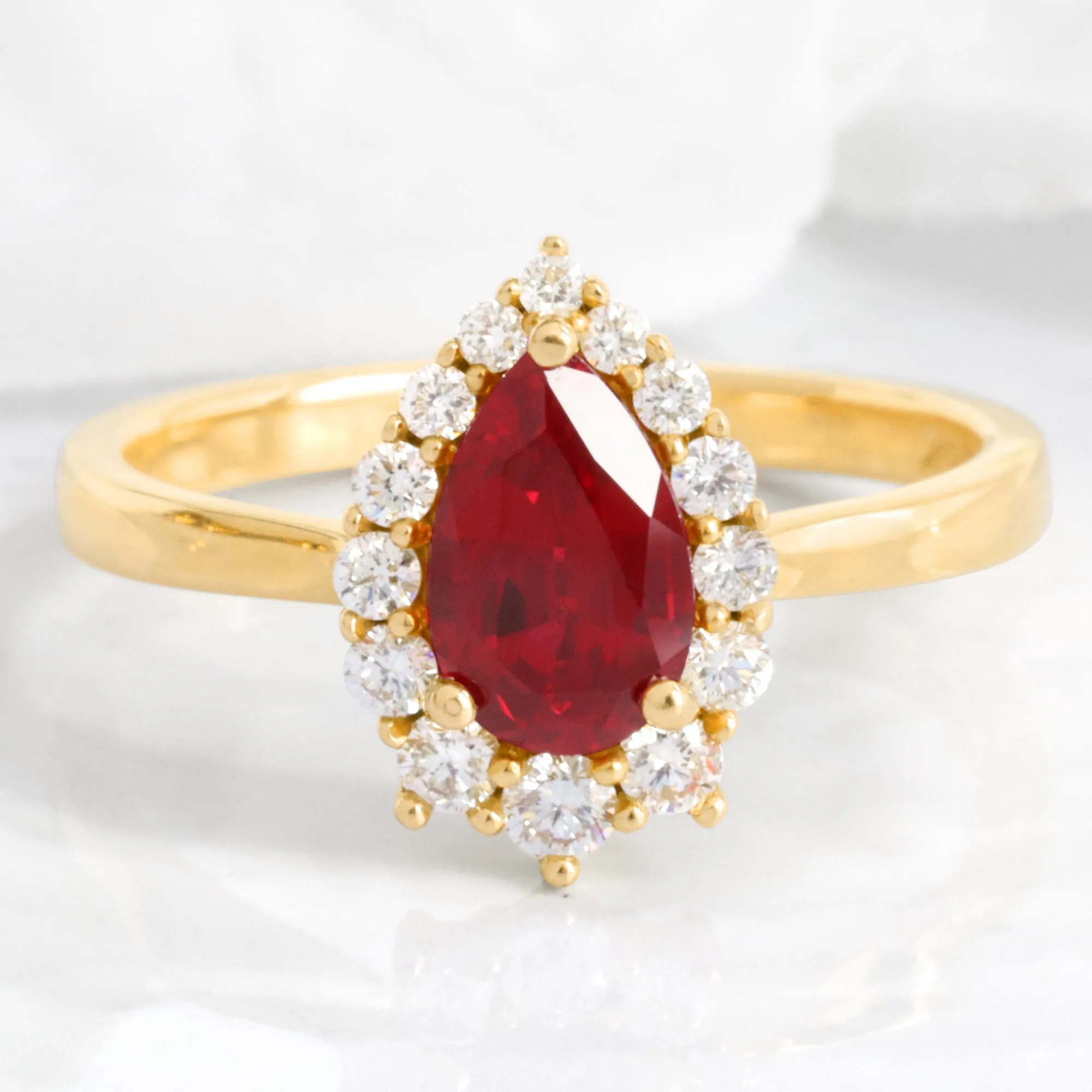 Pear Ruby Engagement Ring in Tiara Halo Diamond Tapered Band